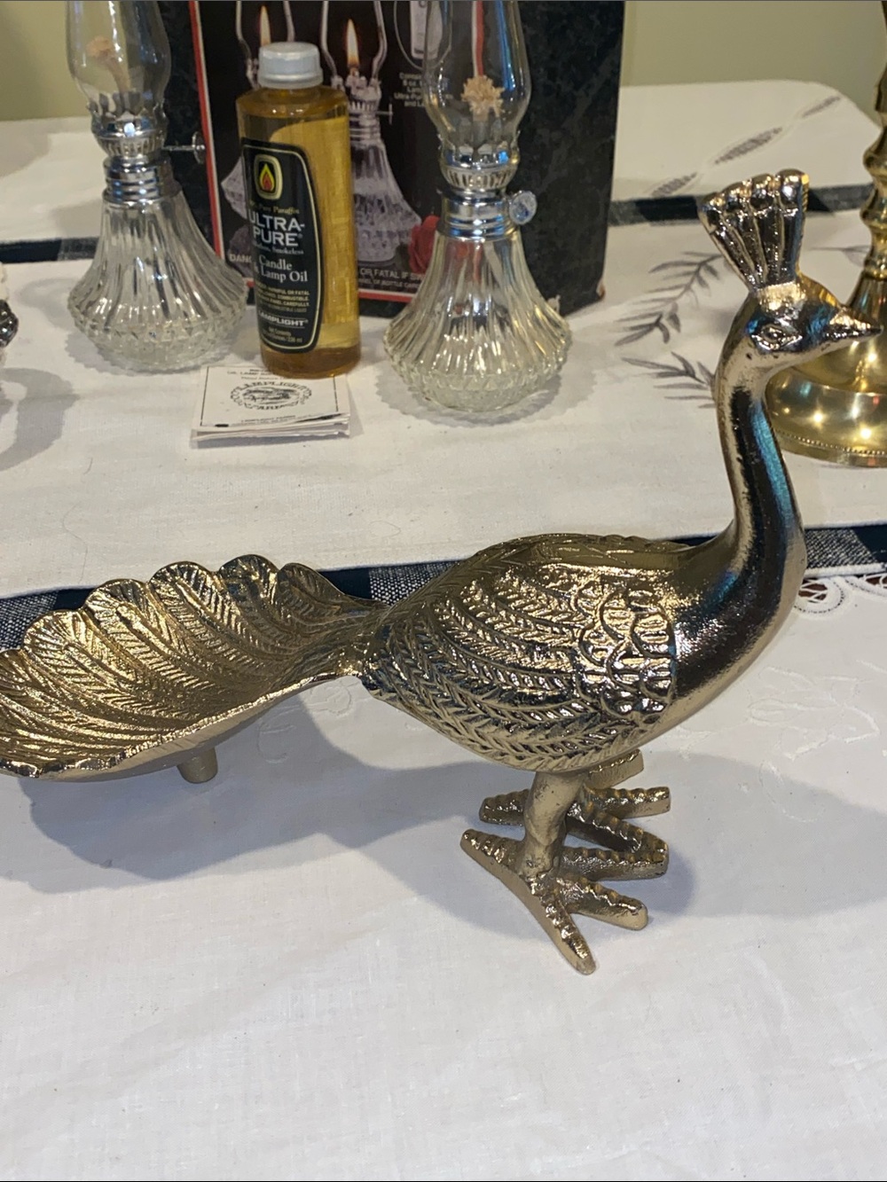 Gold Toned Metal Peacock Tail is a tray